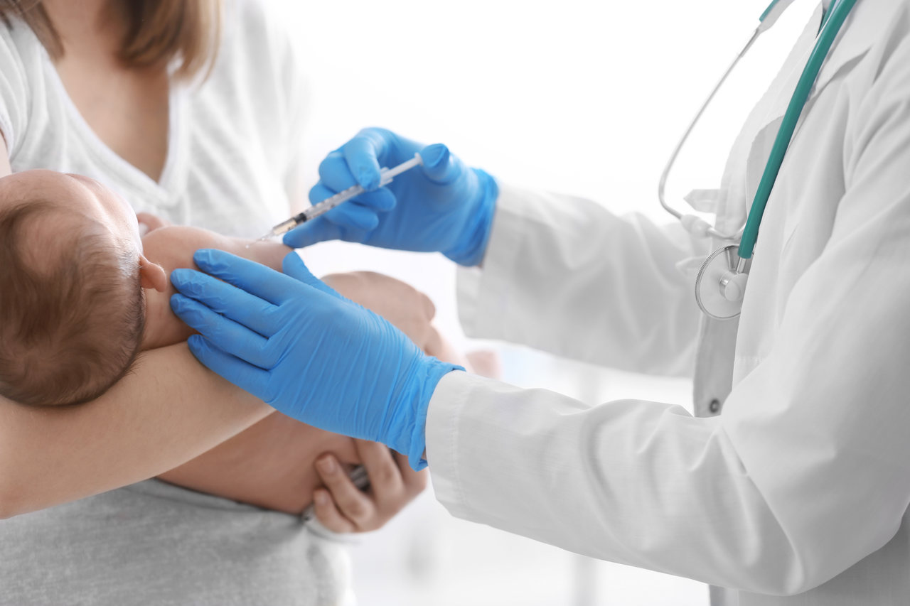 a doctor is vaccination a baby